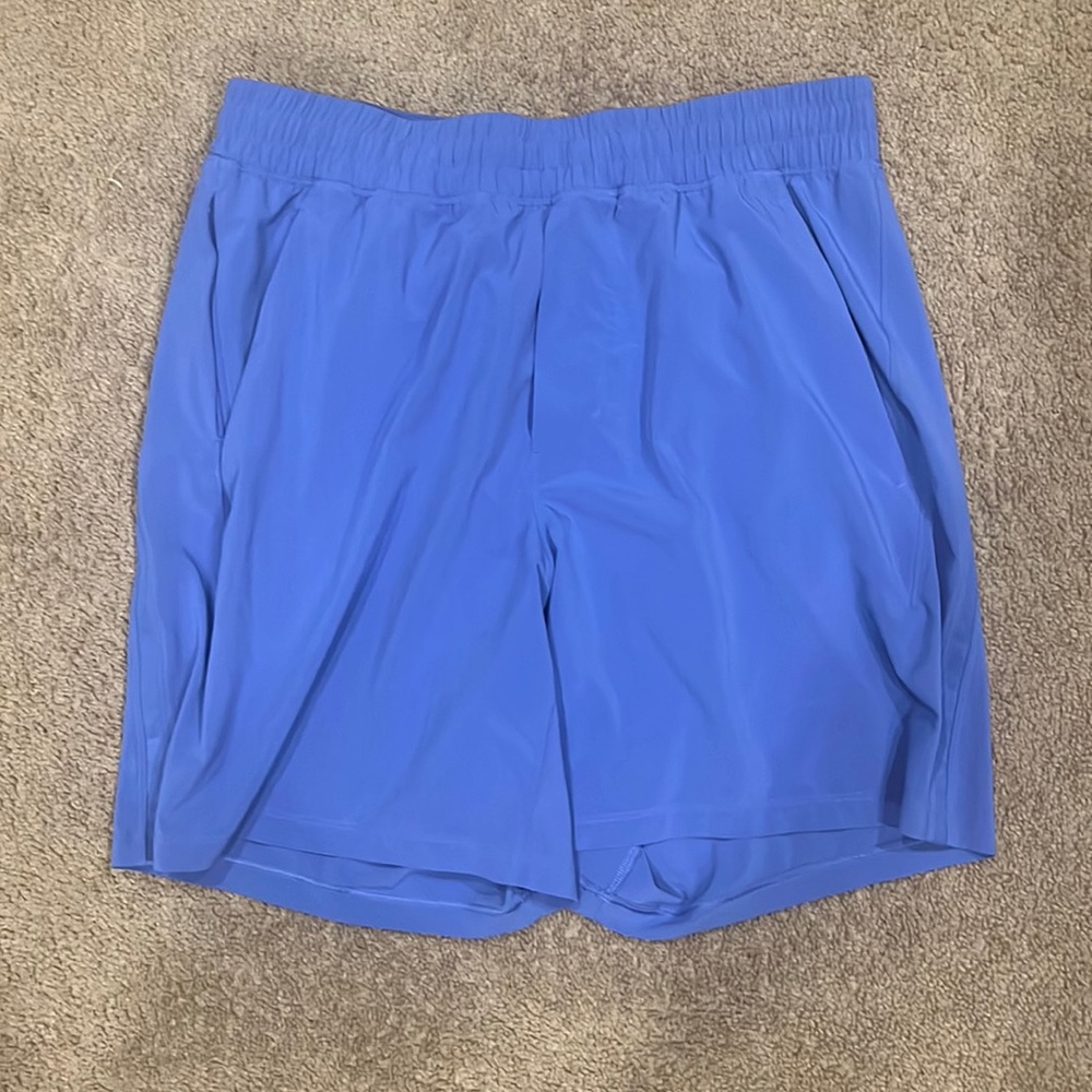 Men’s medium lululemon pace breaker 7 inseam shorts, wild indigo color way.